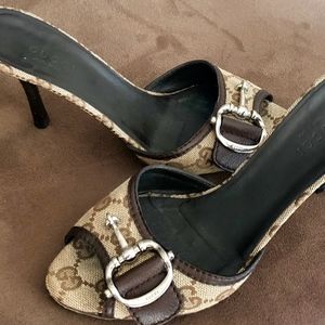 Gucci monogram horse bit slide heel.